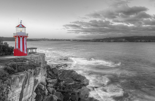 The coast line of Sydney is set to Black and white, Whilst the candy stripped Hornby Lighthouse is in all its Red and white glory.